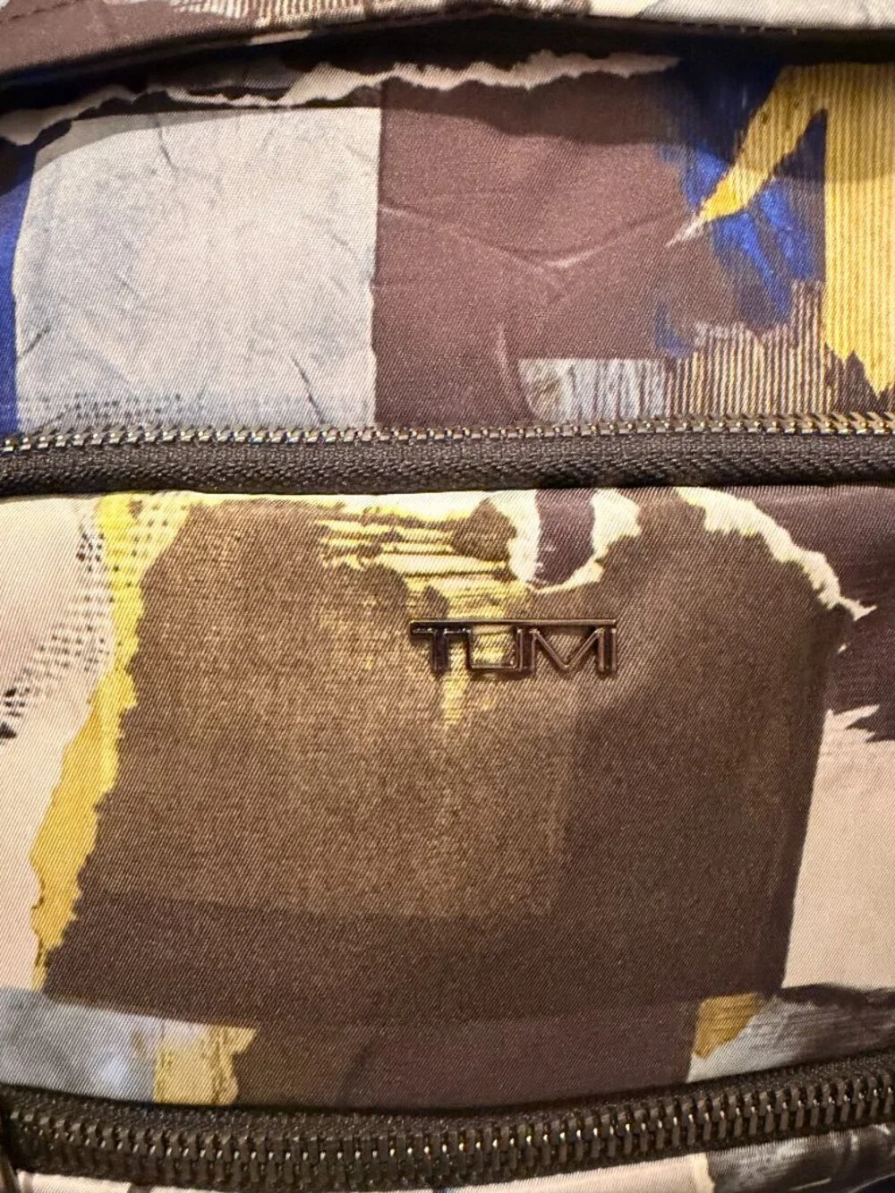 Tumi *only used